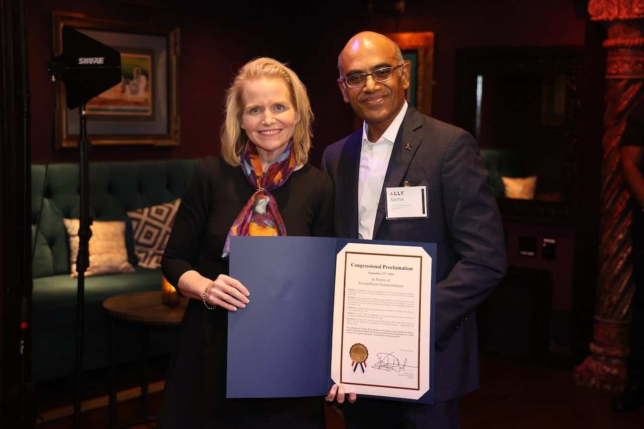 Katie Mehnert presenting Congressional Proclamation to Soma